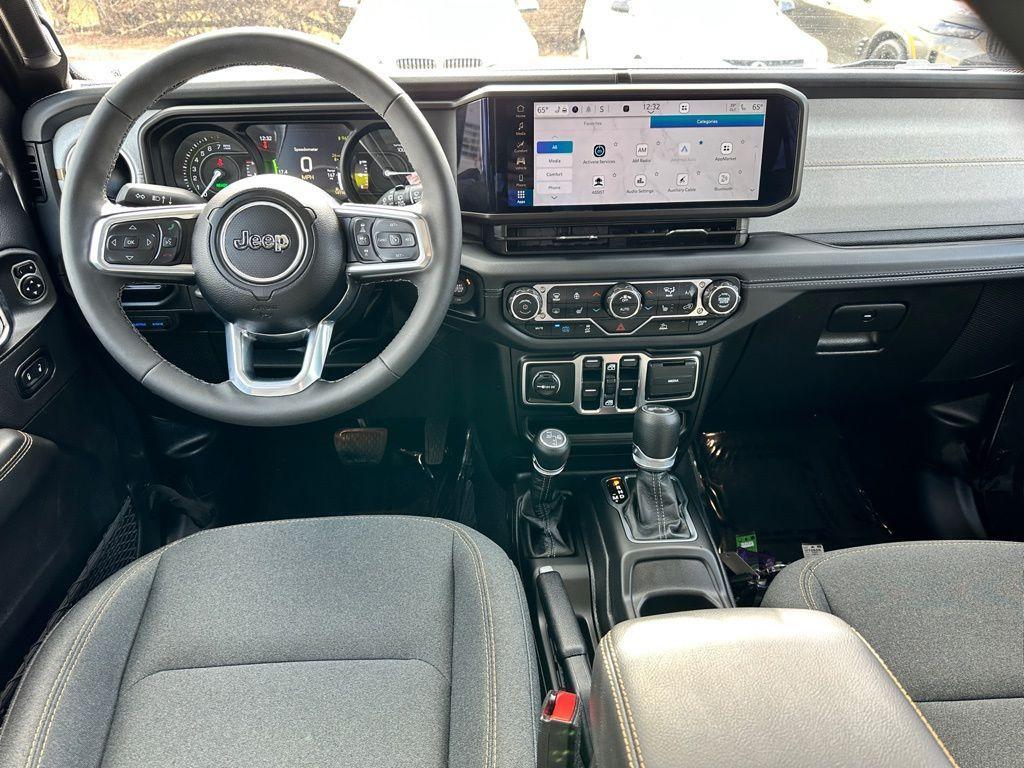 used 2025 Jeep Wrangler 4xe car, priced at $31,614