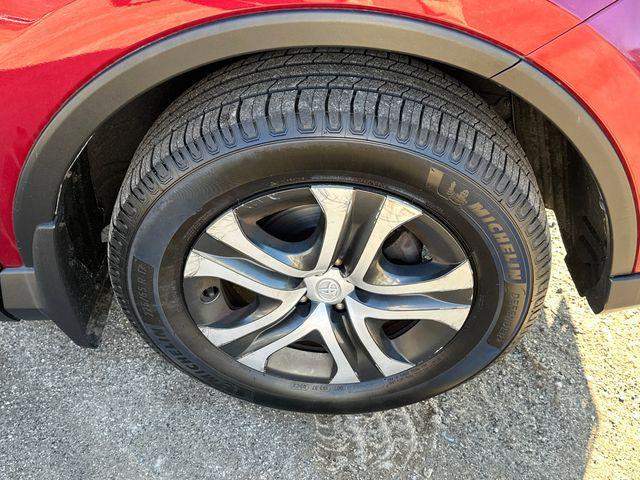 used 2018 Toyota RAV4 car, priced at $19,297