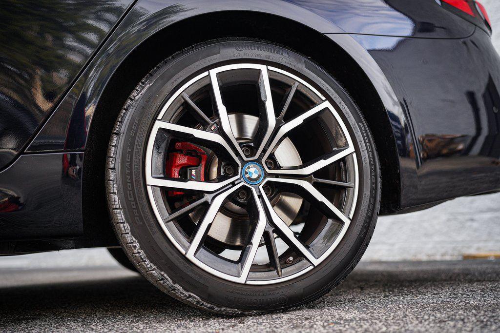 used 2023 BMW 530e car, priced at $32,692