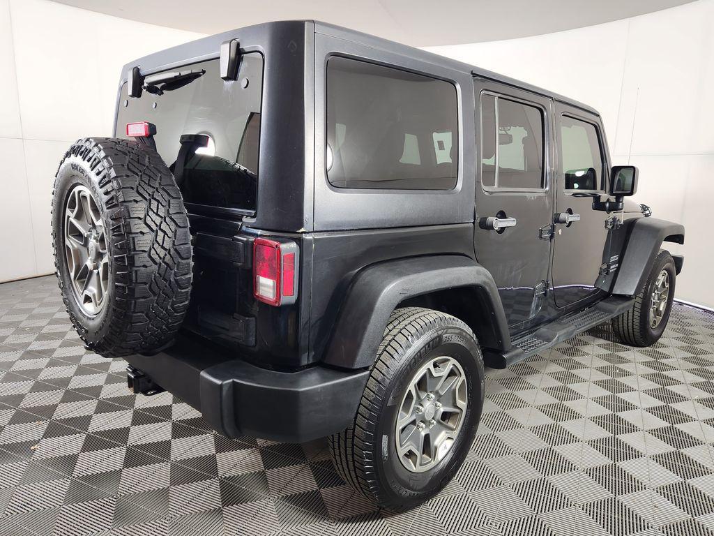 used 2013 Jeep Wrangler Unlimited car, priced at $13,546