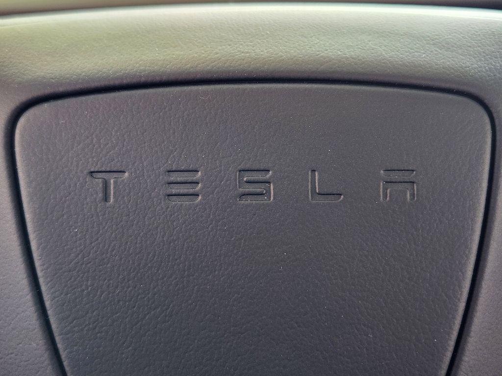 used 2025 Tesla Model 3 car, priced at $48,394
