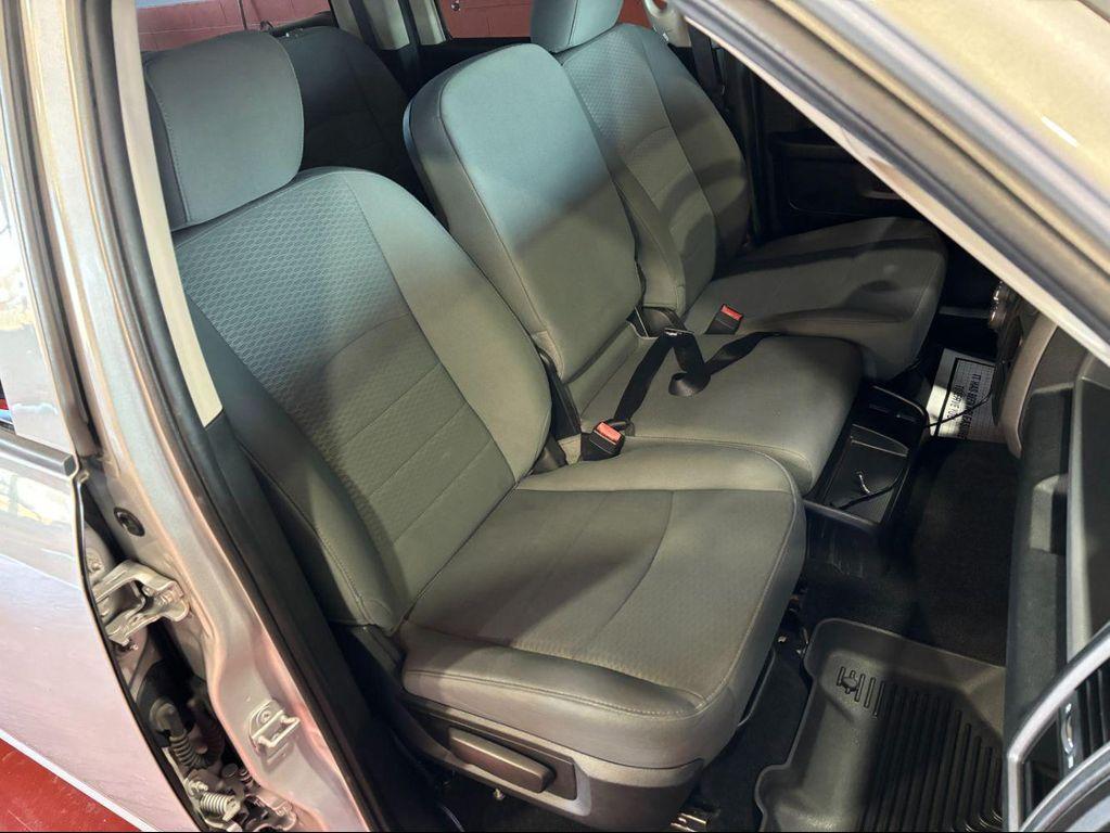 used 2018 Ram 1500 car, priced at $25,999