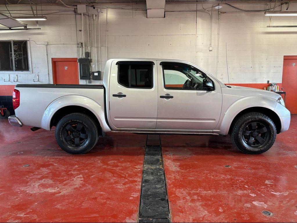 used 2013 Nissan Frontier car, priced at $12,869