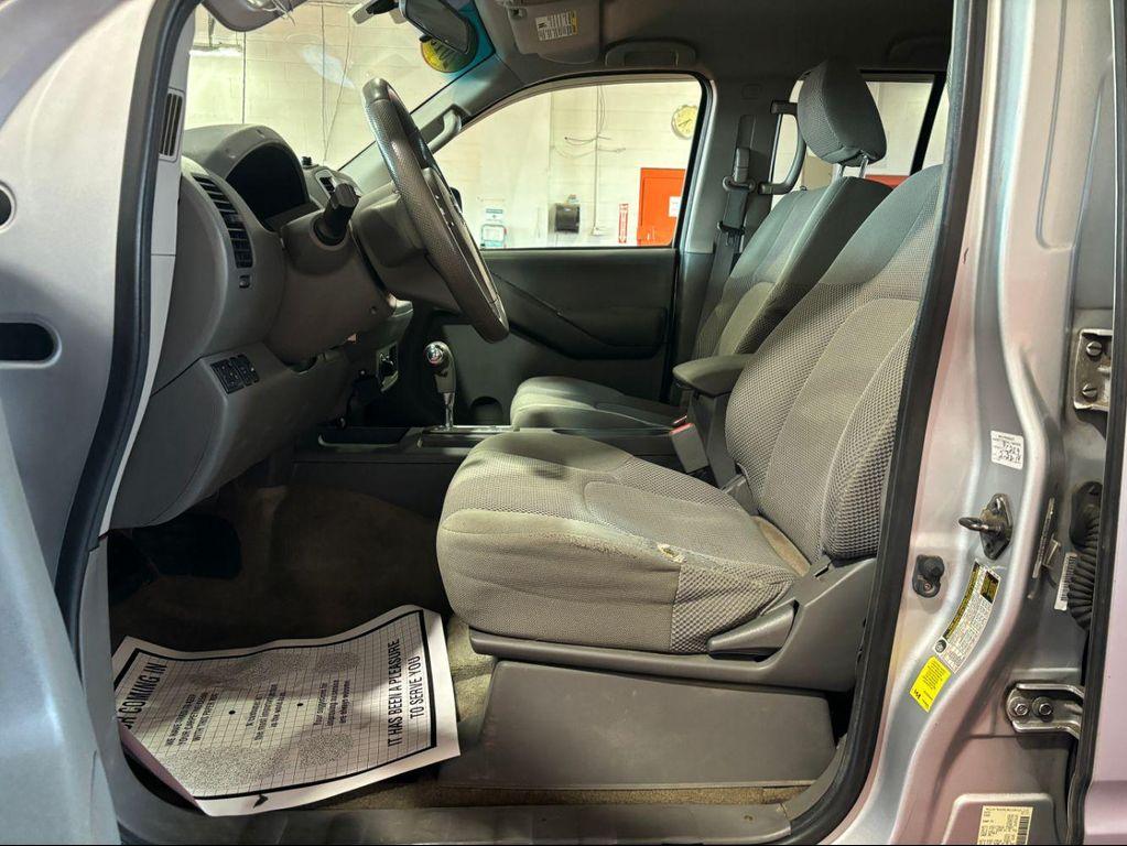 used 2013 Nissan Frontier car, priced at $12,869