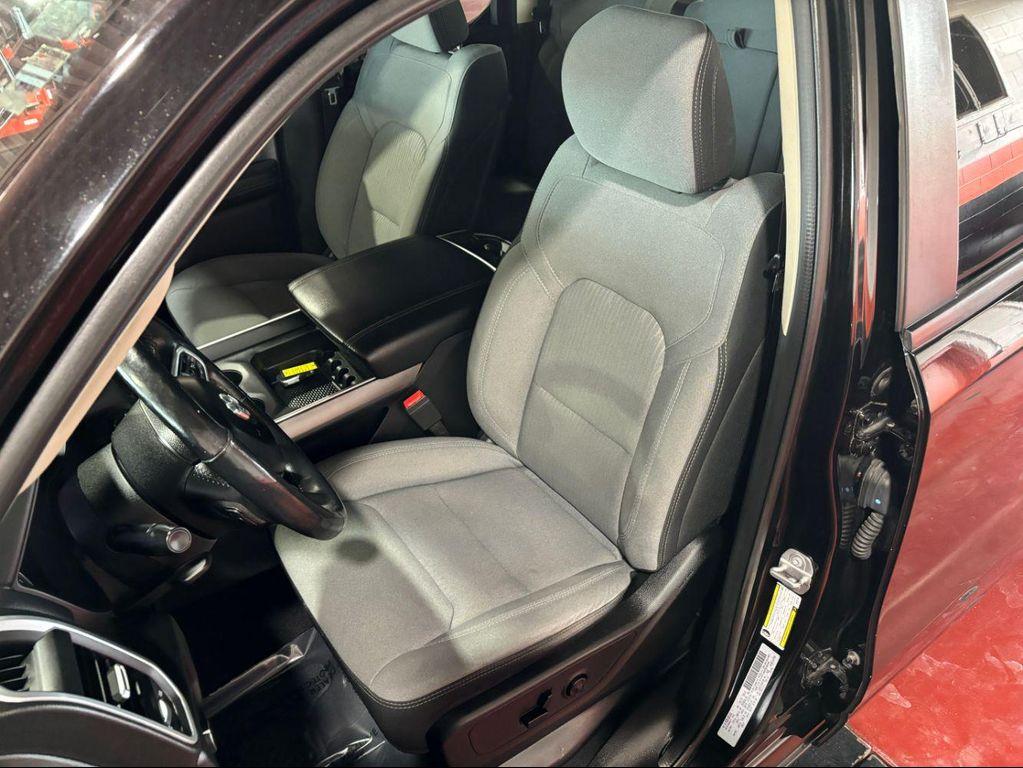 used 2019 Ram 1500 car, priced at $27,853