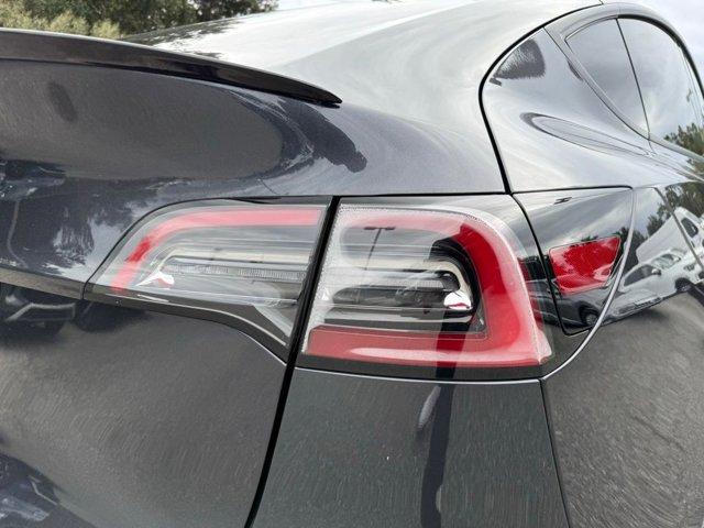 used 2024 Tesla Model Y car, priced at $29,800