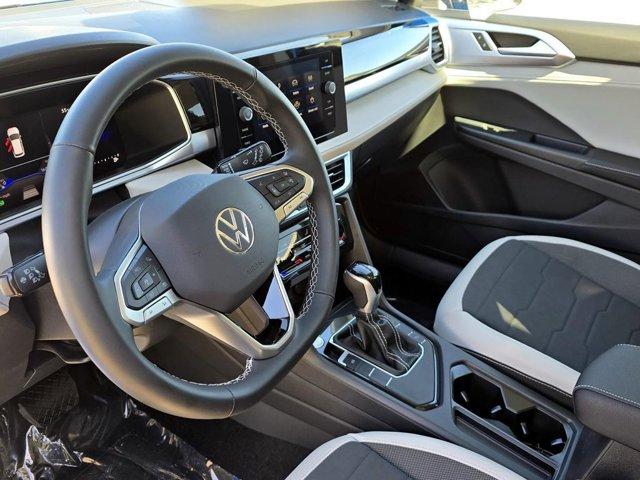 new 2025 Volkswagen Taos car, priced at $25,999