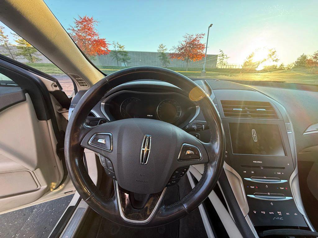used 2016 Lincoln MKZ car, priced at $10,999