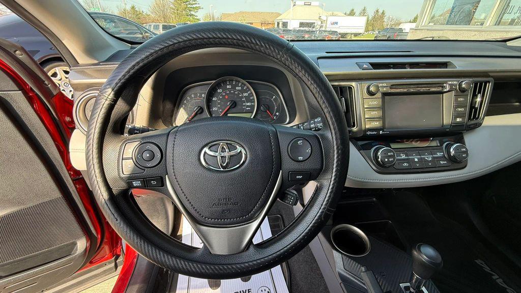 used 2015 Toyota RAV4 car, priced at $13,899