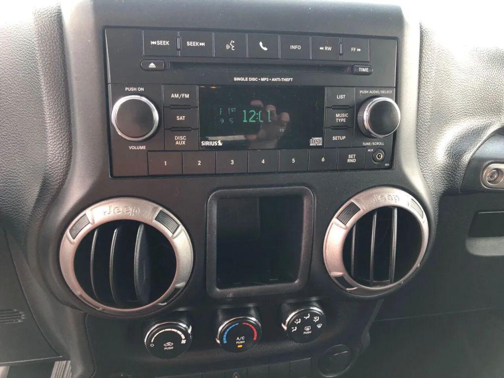 used 2015 Jeep Wrangler Unlimited car, priced at $16,999
