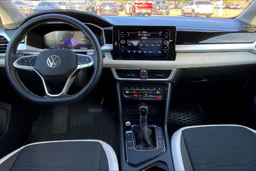 used 2025 Volkswagen Taos car, priced at $28,700
