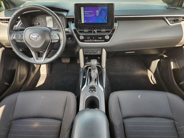 used 2024 Toyota Corolla Cross Hybrid car, priced at $32,348