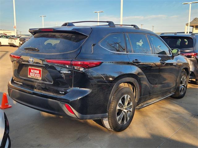 used 2021 Toyota Highlander Hybrid car, priced at $27,991