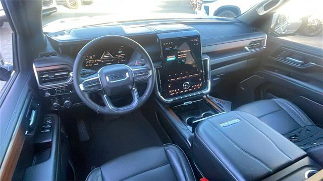 used 2025 GMC Yukon XL car, priced at $70,552