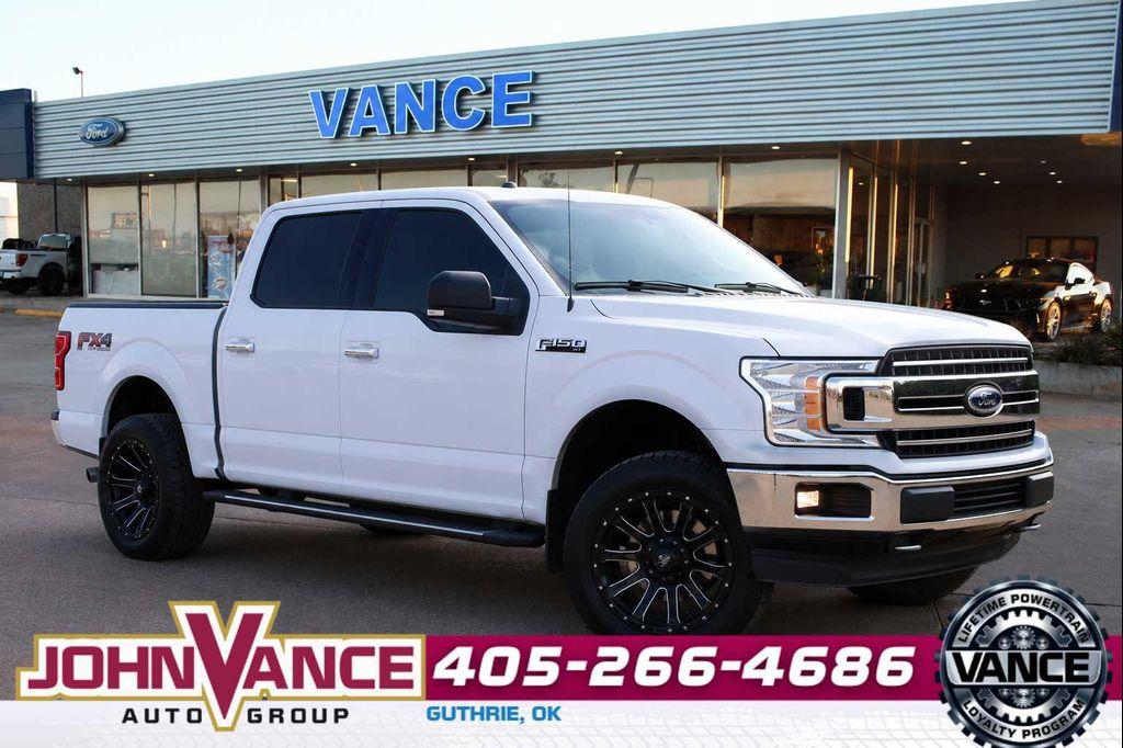 used 2018 Ford F-150 car, priced at $23,494