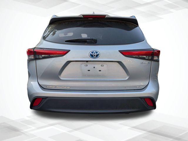 used 2021 Toyota Highlander Hybrid car, priced at $29,998