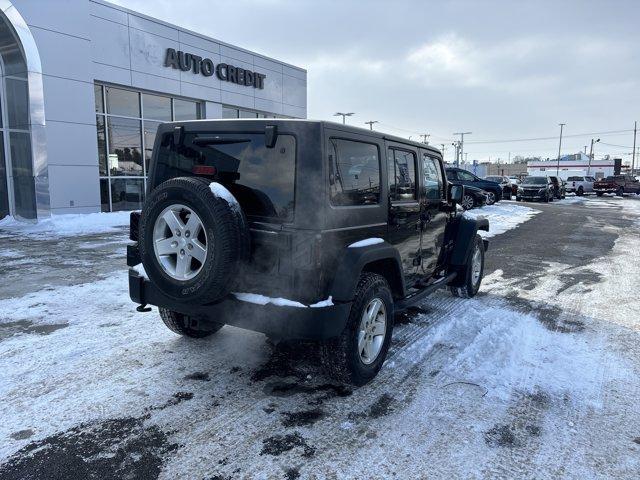 used 2015 Jeep Wrangler Unlimited car, priced at $17,449