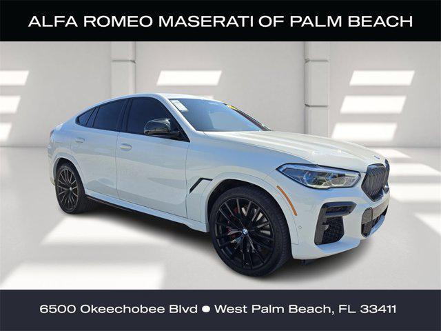used 2022 BMW X6 car, priced at $57,601