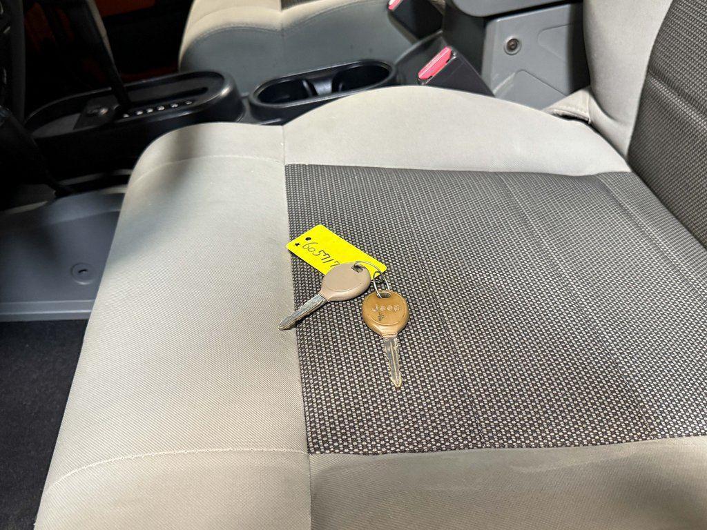 used 2010 Jeep Wrangler Unlimited car, priced at $12,989