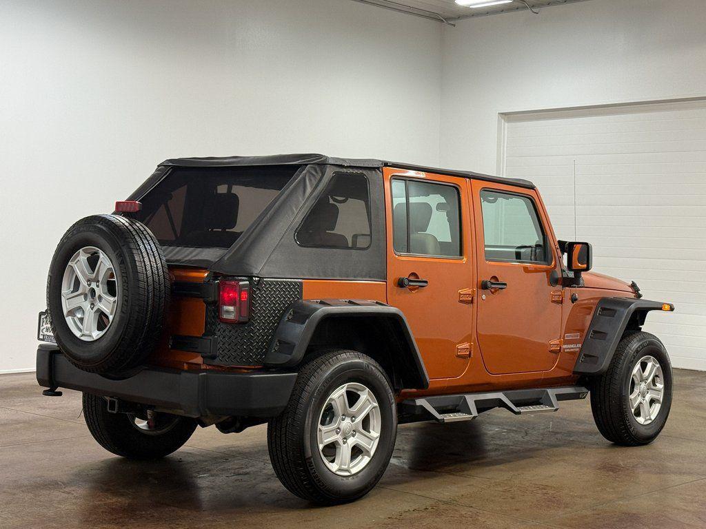 used 2010 Jeep Wrangler Unlimited car, priced at $12,989