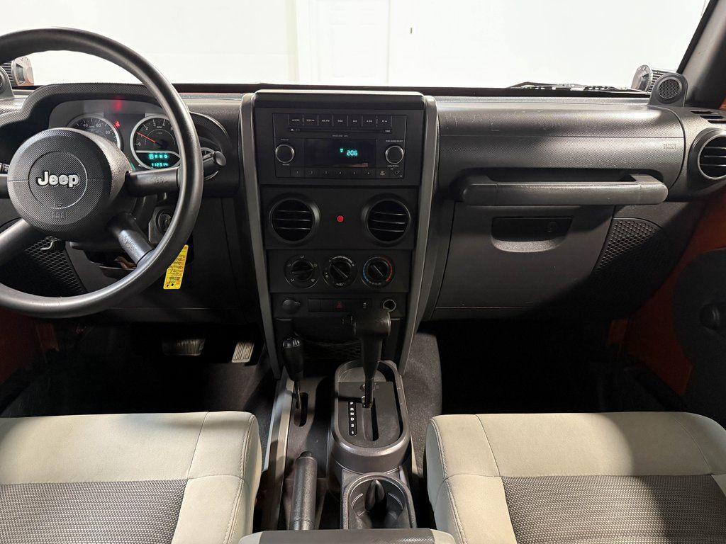 used 2010 Jeep Wrangler Unlimited car, priced at $12,989