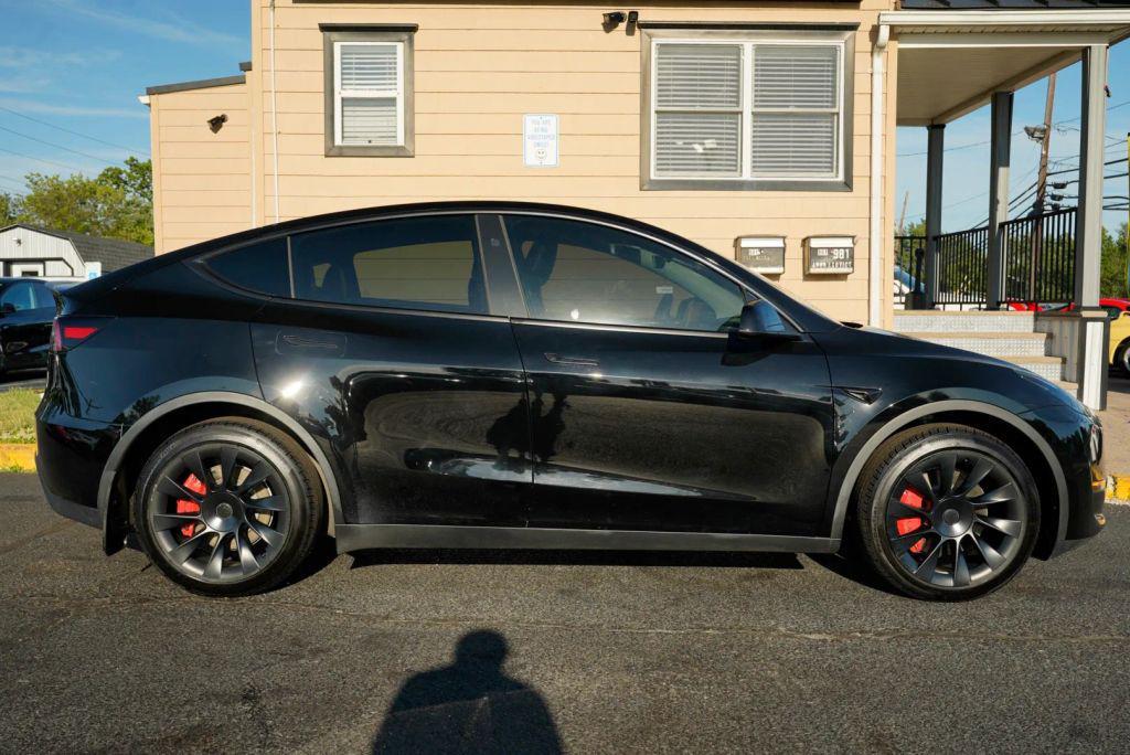 used 2023 Tesla Model Y car, priced at $28,999