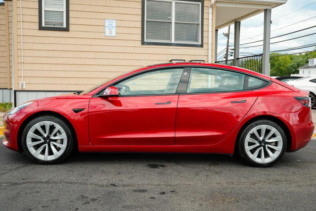 used 2023 Tesla Model 3 car, priced at $19,999