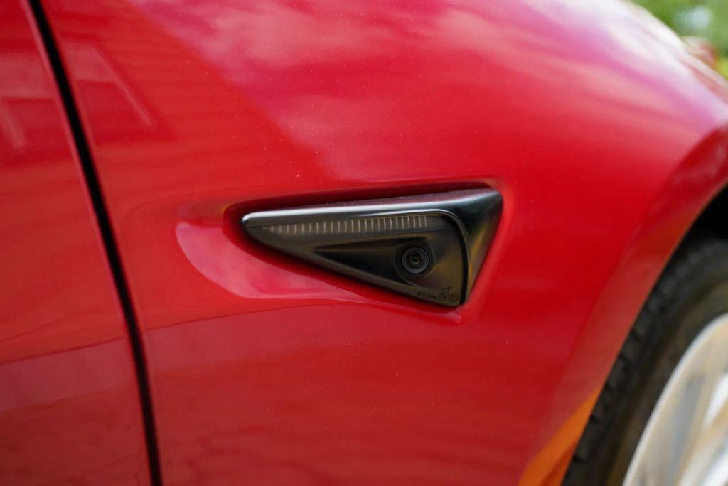 used 2023 Tesla Model 3 car, priced at $19,999