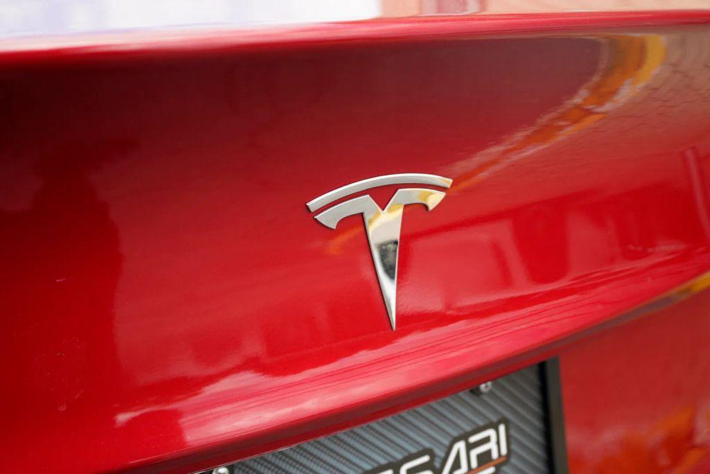 used 2023 Tesla Model 3 car, priced at $19,999