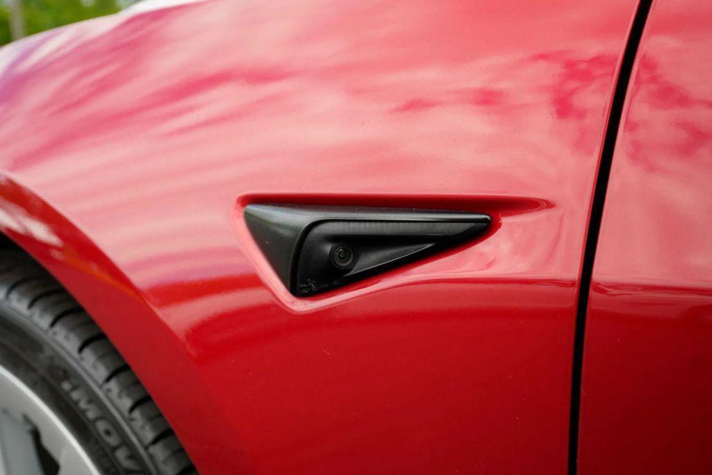 used 2023 Tesla Model 3 car, priced at $19,999