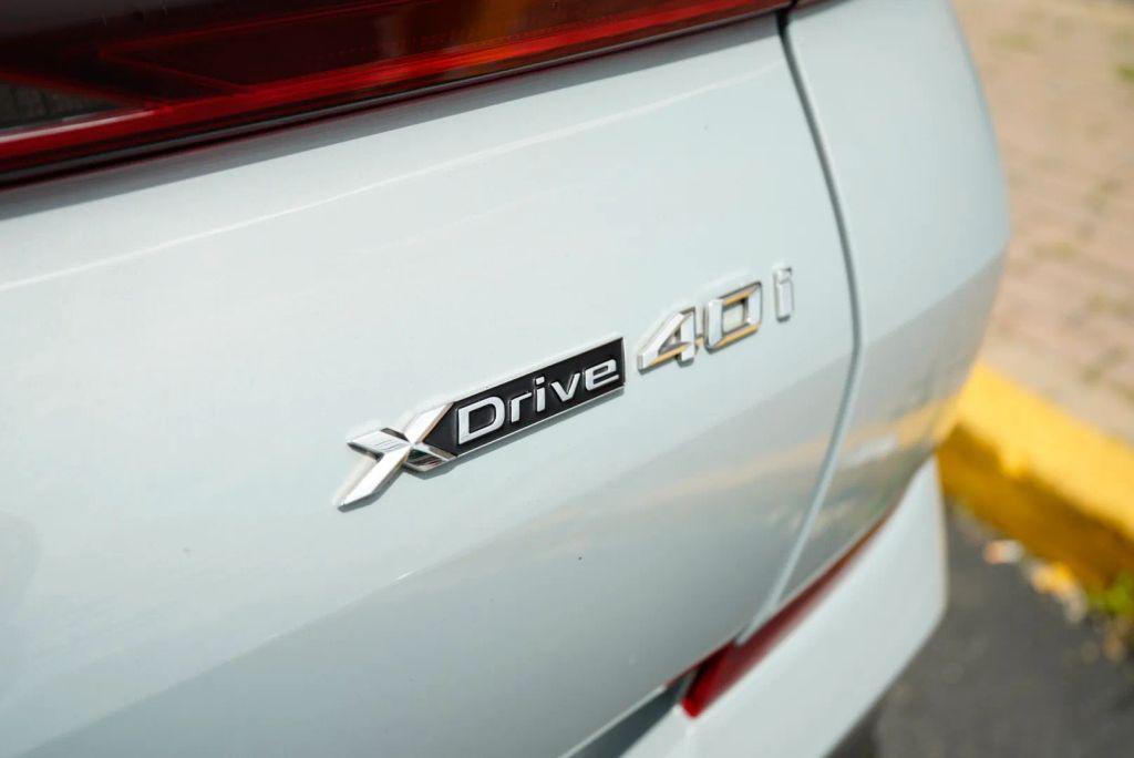 used 2024 BMW X6 car, priced at $59,999
