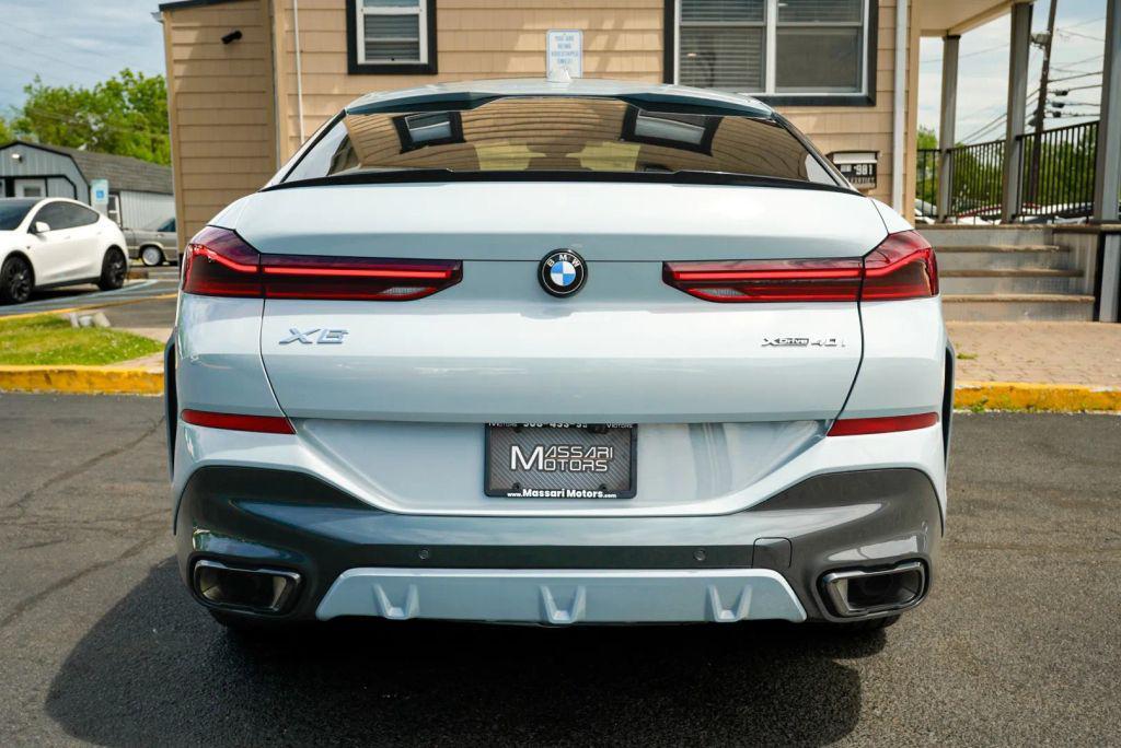 used 2024 BMW X6 car, priced at $59,999