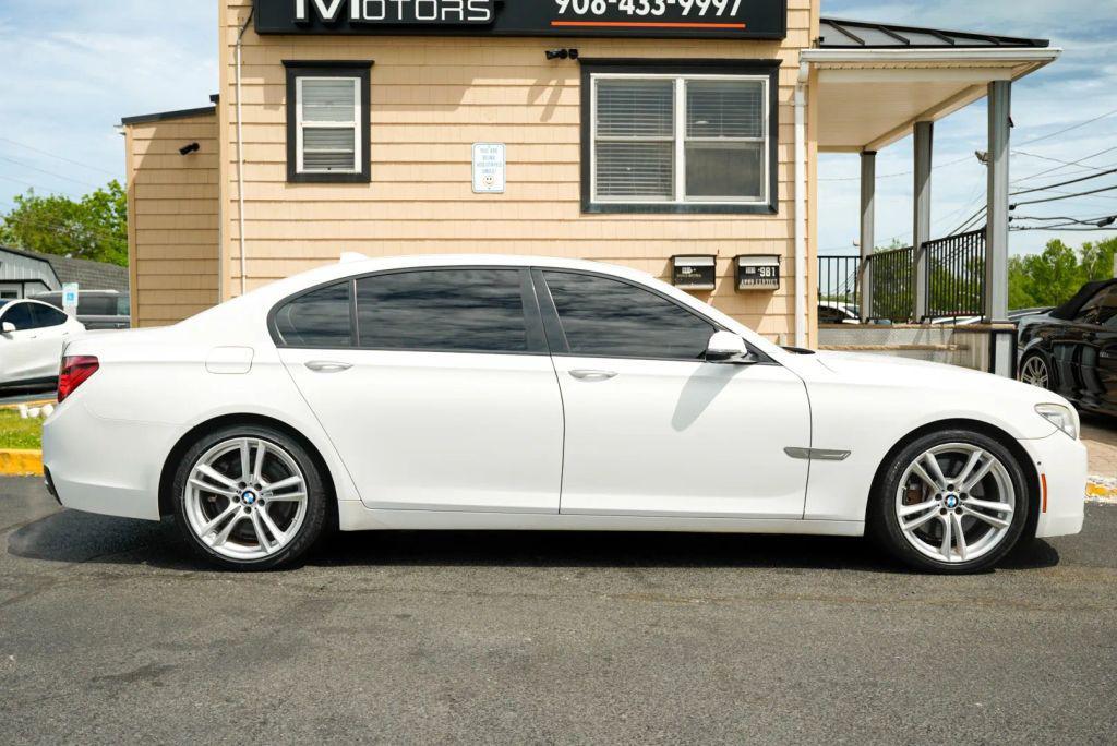 used 2015 BMW 750 car, priced at $12,999