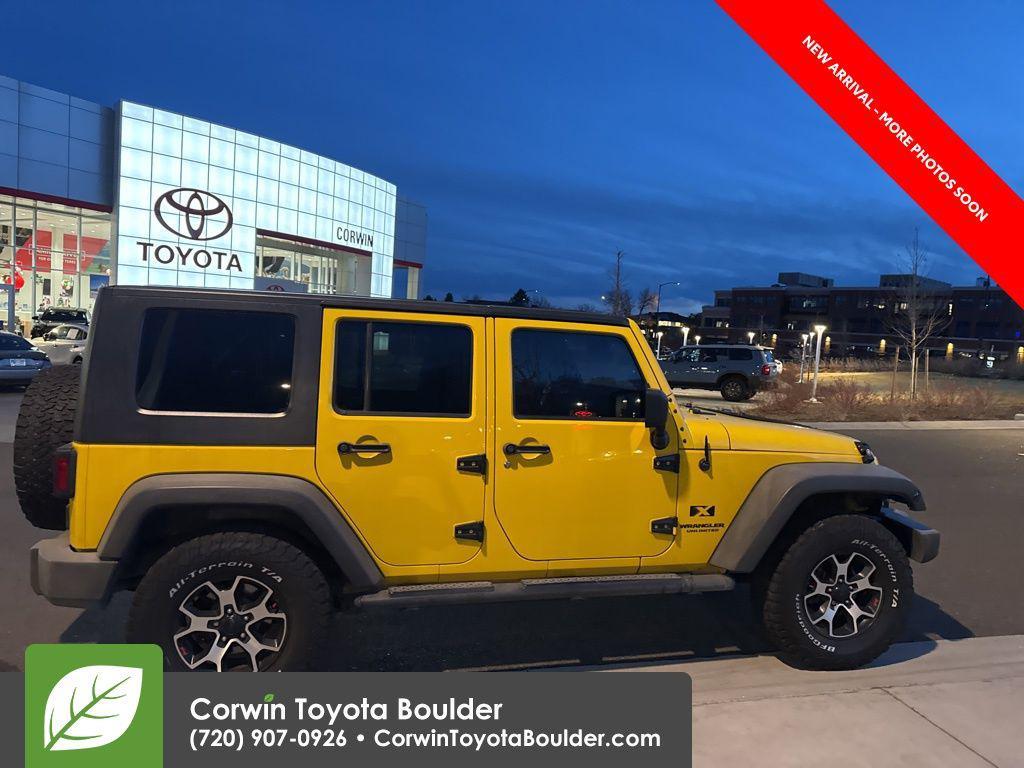used 2009 Jeep Wrangler Unlimited car, priced at $12,000