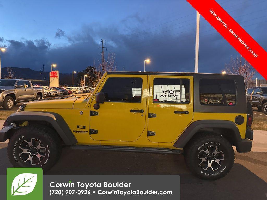 used 2009 Jeep Wrangler Unlimited car, priced at $12,000