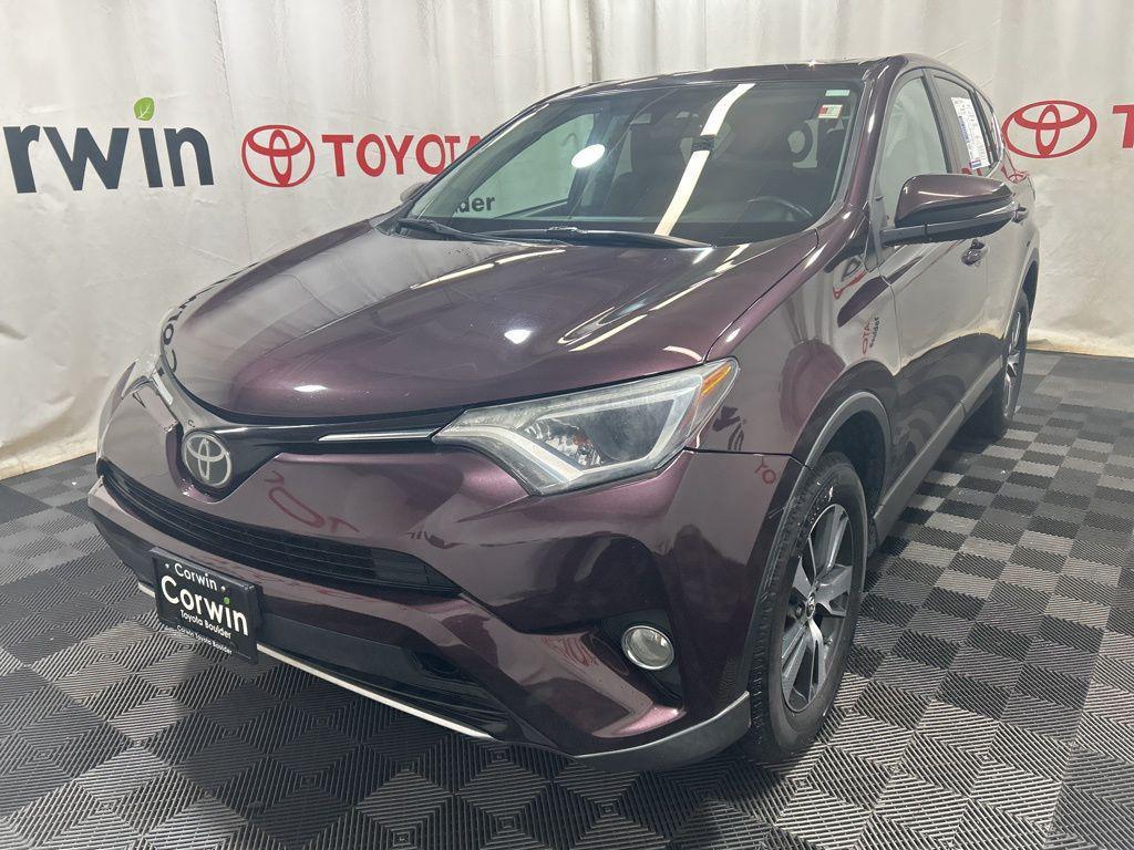 used 2018 Toyota RAV4 car, priced at $18,000