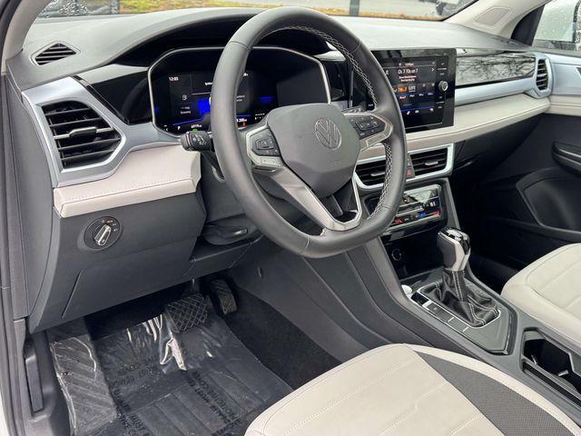 used 2025 Volkswagen Taos car, priced at $22,499