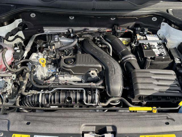 used 2025 Volkswagen Taos car, priced at $23,619