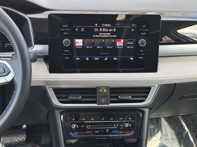 used 2025 Volkswagen Taos car, priced at $23,619