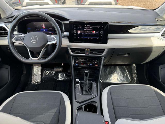 used 2025 Volkswagen Taos car, priced at $23,619