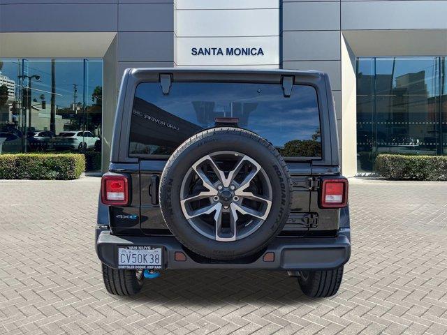 used 2024 Jeep Wrangler 4xe car, priced at $30,296