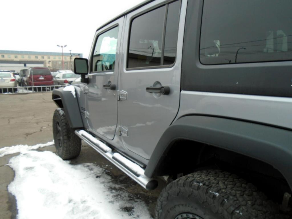 used 2018 Jeep Wrangler JK Unlimited car, priced at $17,697