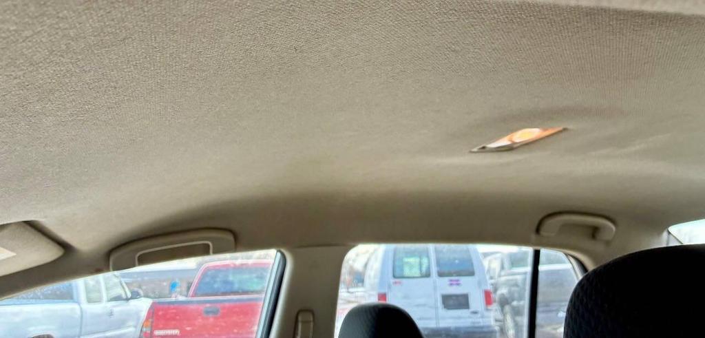 used 2010 Nissan Versa car, priced at $5,950