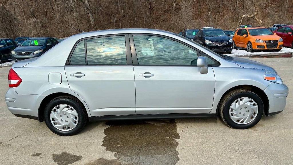used 2010 Nissan Versa car, priced at $5,950