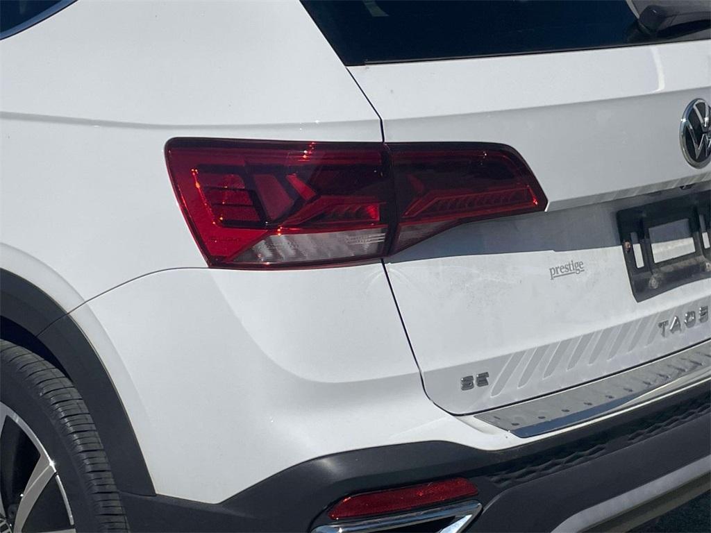 used 2023 Volkswagen Taos car, priced at $21,000