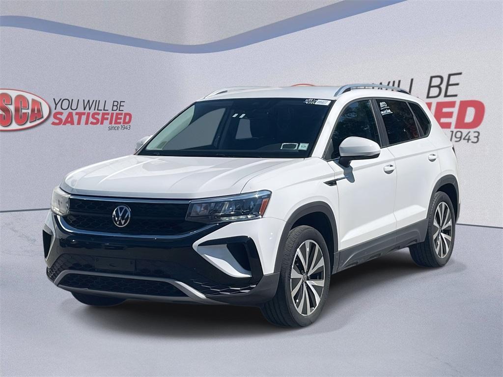 used 2023 Volkswagen Taos car, priced at $21,000