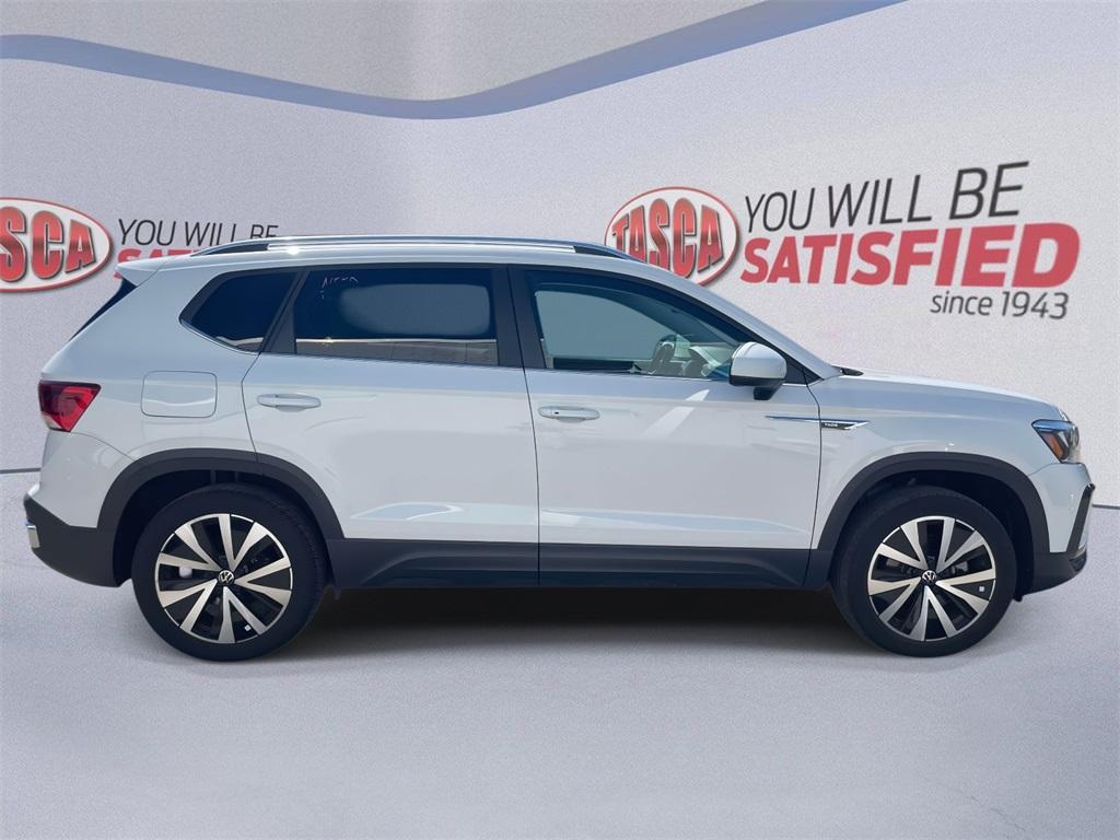 used 2023 Volkswagen Taos car, priced at $21,000