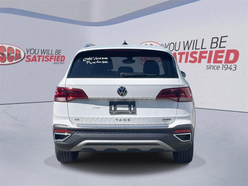 used 2023 Volkswagen Taos car, priced at $21,000