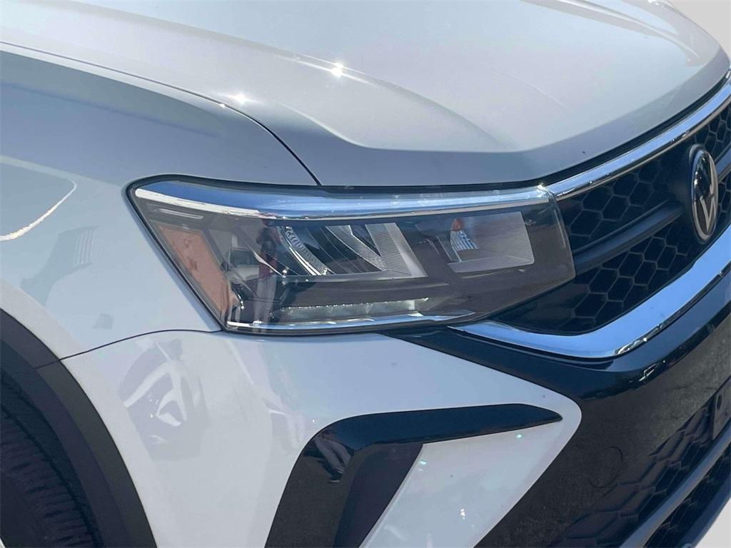 used 2023 Volkswagen Taos car, priced at $21,000