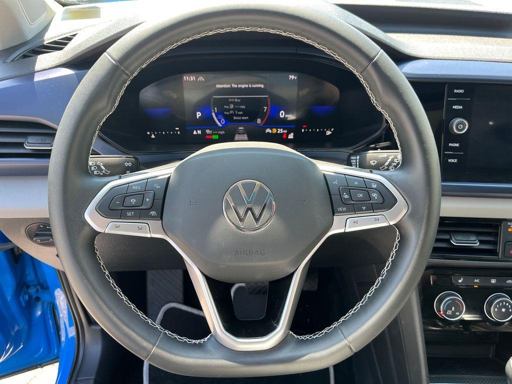 used 2023 Volkswagen Taos car, priced at $23,506